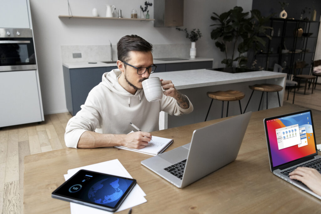 Man working from home having coffee